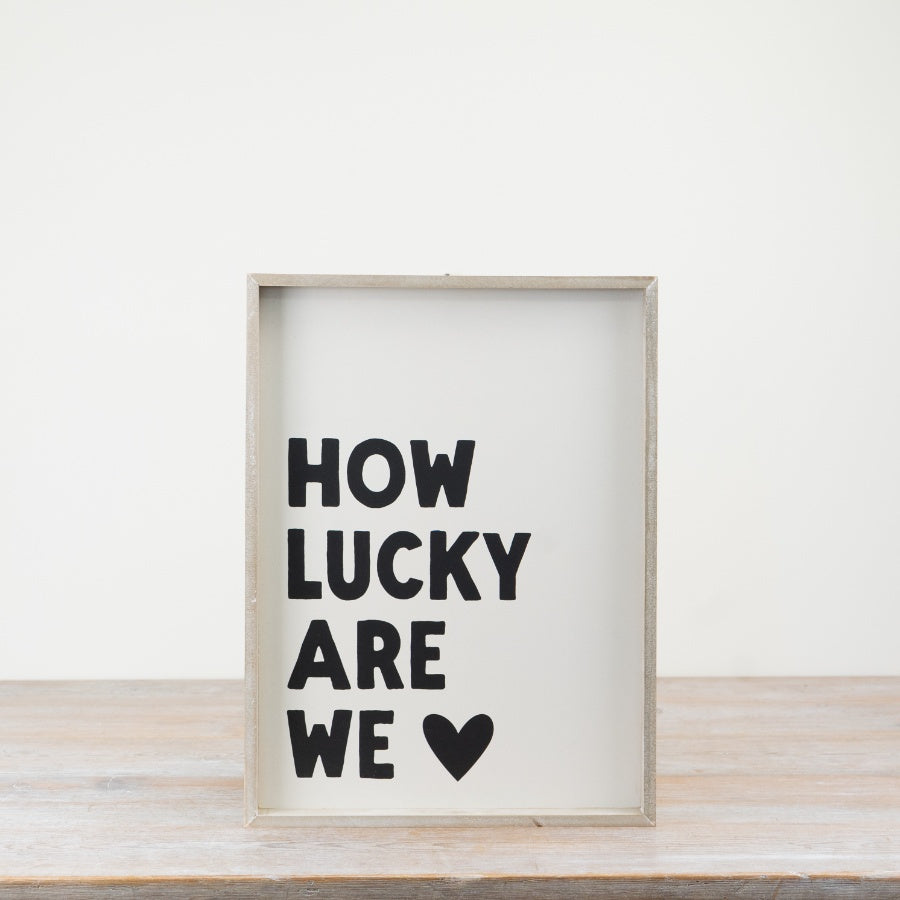 How Lucky Are We Sign